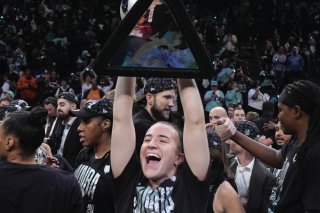 Sabrina Ionescu et ses équipières savourent le 1er titre de l'histoire du New York Liberty KEYSTONE/AP/Pamela Smith